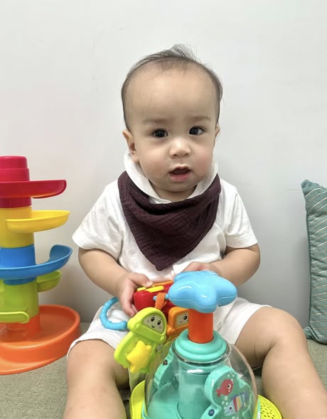 Baby playing at Health Plus clinic